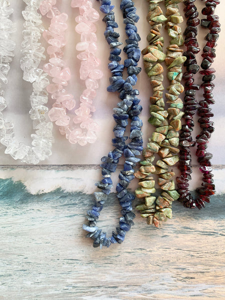 The Surfer Boy Necklace (Garnet)